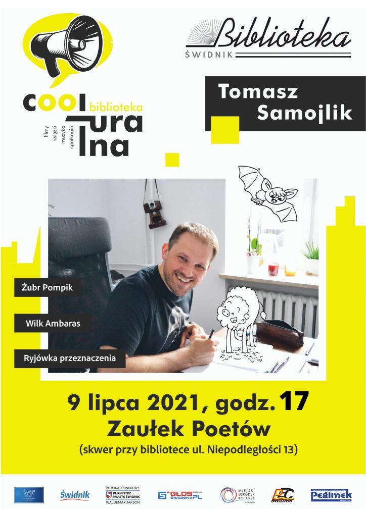 na plakacie uśmiechnięty Tomasz Samojlik